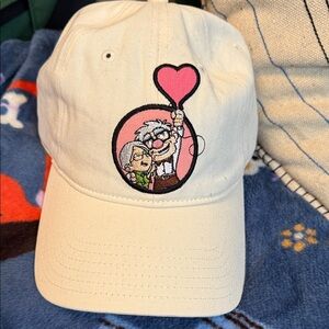 UP Pixar LOVE IS IN THE AIR on back- Cream Hat with Pink balloon Heart Design